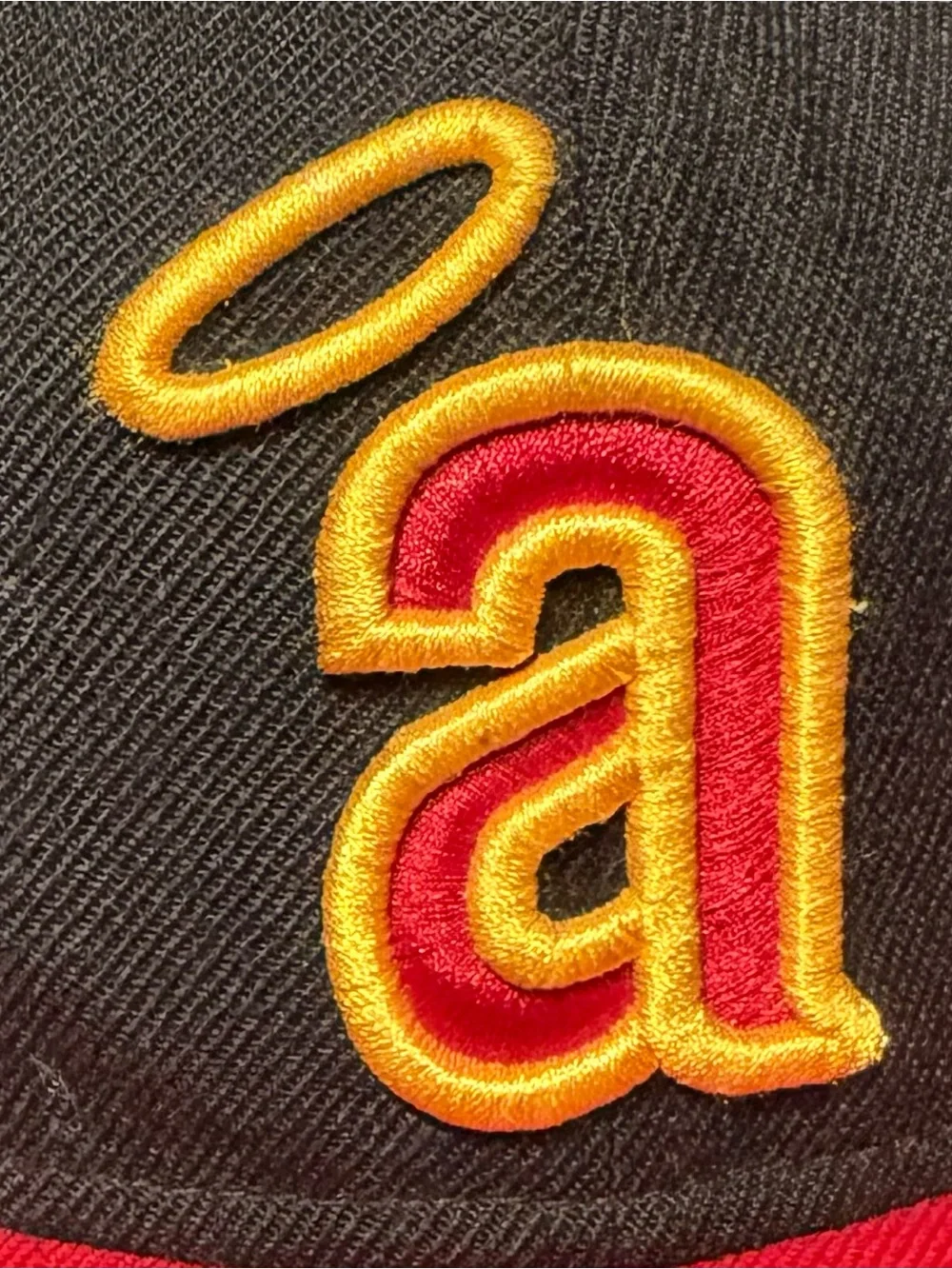 New Era Black Cap with Red Brim and Yellow Logo